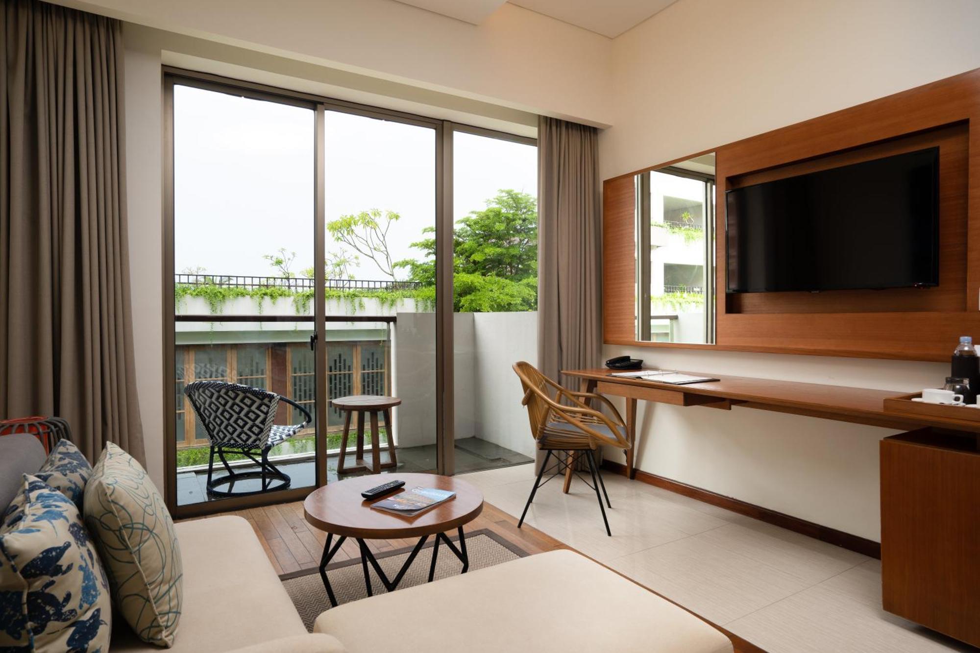 Merusaka Nusa Dua Esterno foto A room at the hotel